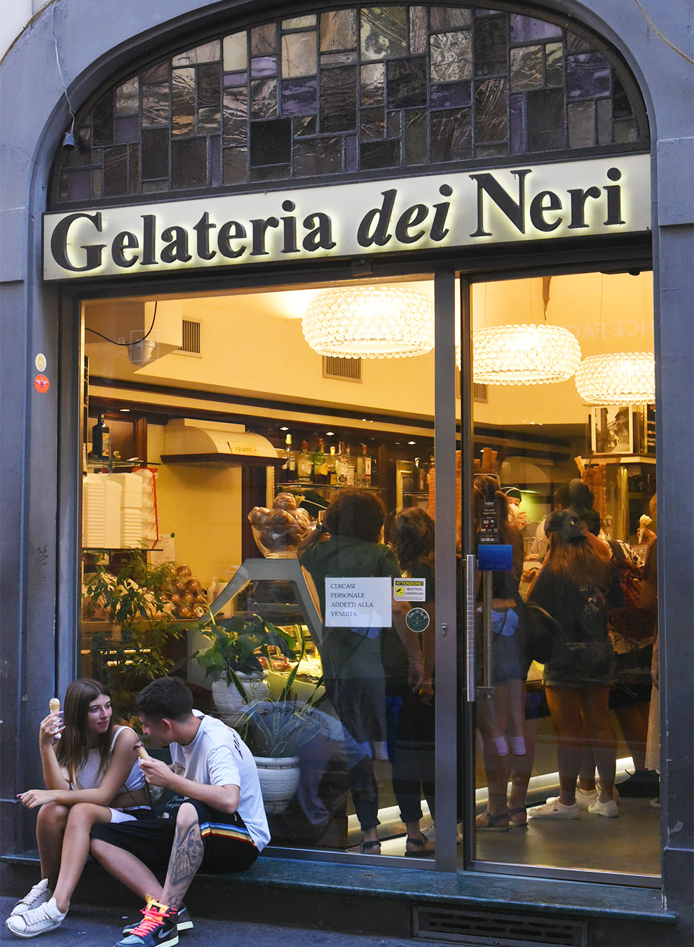 Clients having gelato in front of the gelateria Dei Neri in Florence 