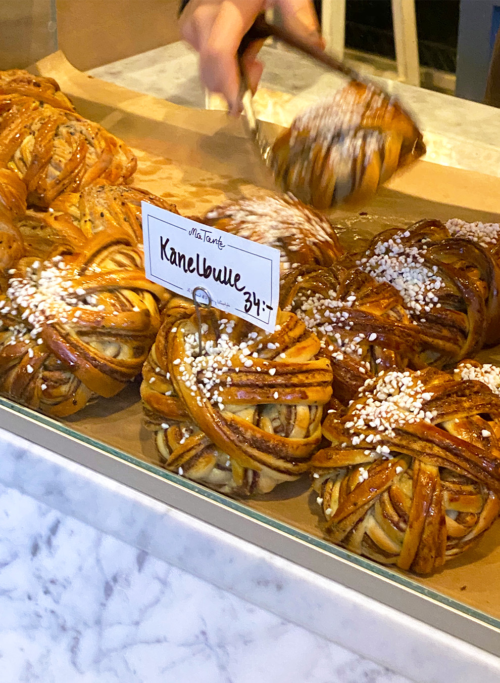 The traditional Swedish pastry Kanelbulle at the Ostermalms Saluhall market in Stockholm