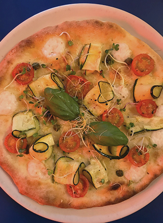 Pizza vegana no restaurante Mastino V em Amsterdam